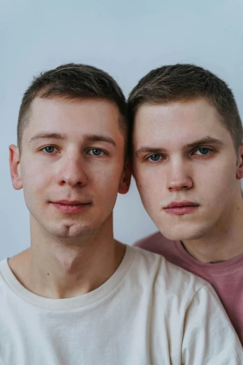 a couple of young men standing next to each other, by Adam Marczyński, reddit, close - up studio photo, 15081959 21121991 01012000 4k