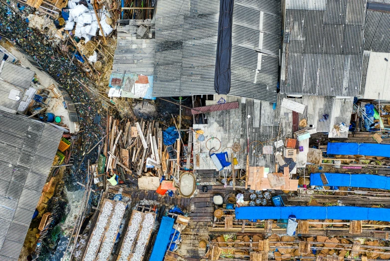 a group of buildings that are next to each other, pexels contest winner, conceptual art, shanty town, flatlay, debris, fish market stalls