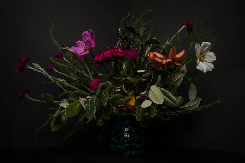 a vase filled with lots of different colored flowers, inspired by François Boquet, unsplash, vanitas, dramatic lowkey studio lighting, lustful vegetation, magnolia stems, in a style blend of botticelli