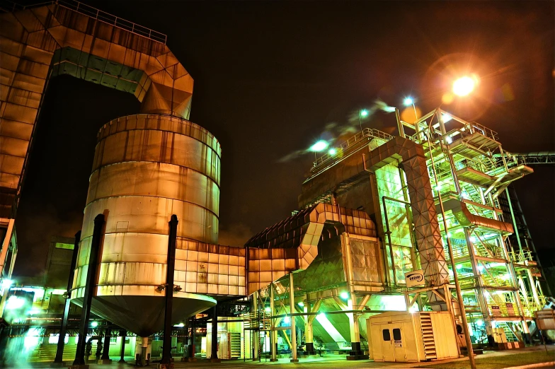 a large industrial plant lit up at night, instagram picture, fan favorite, jakarta, maintenance photo