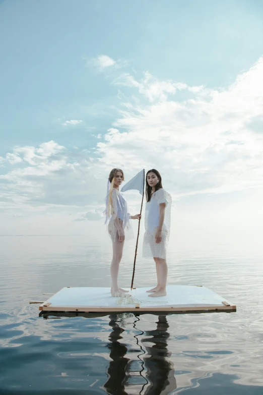 two women standing on a paddle board in the water, a picture, by Fei Danxu, conceptual art, uniform off - white sky, ( ( theatrical ) ), promotional image, japanese