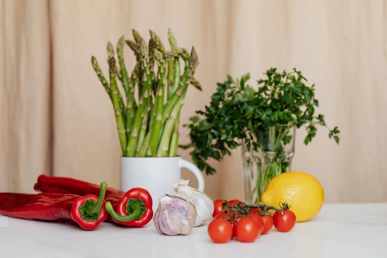 a bunch of vegetables sitting on top of a table, indoor picture