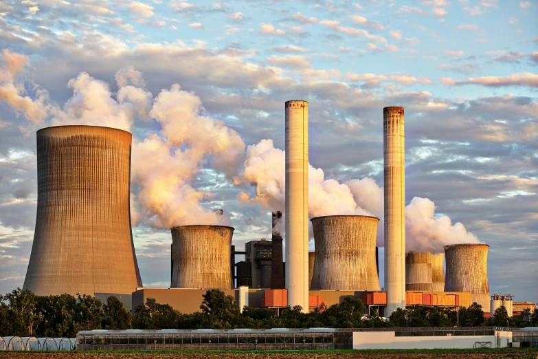 a factory with a lot of smoke coming out of it, pexels contest winner, power plants, national geohraphic, brown, random background scene