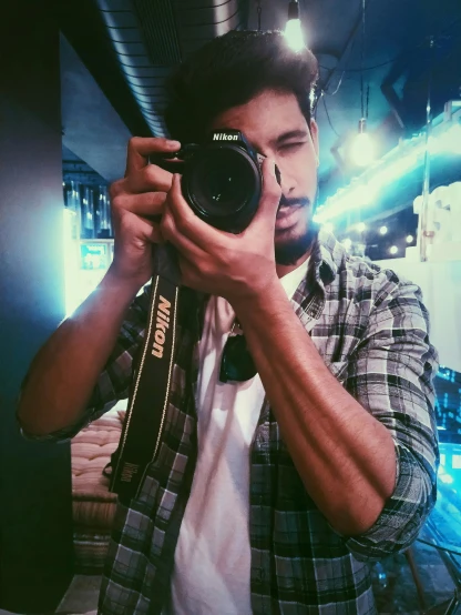 a man taking a picture of himself with a camera, by Robbie Trevino, low quality photo, close up dslr studio photograph, mid-shot of a hunky, jayison devadas