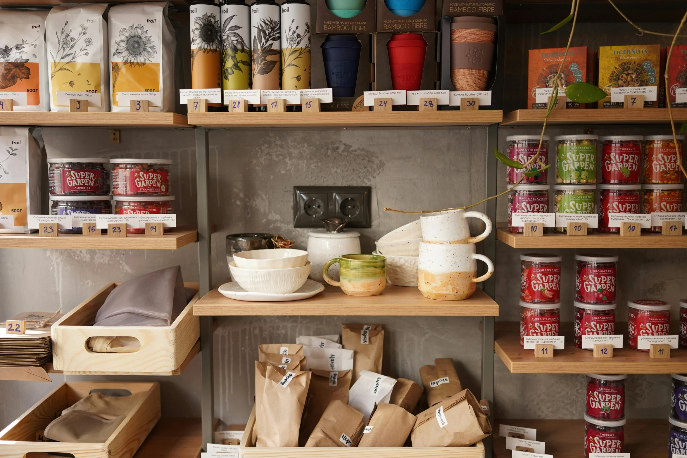 a shelf filled with lots of different types of food, a portrait, inspired by Richmond Barthé, unsplash, private press, starbucks aprons and visors, on textured base; store website, raku, large jars on shelves