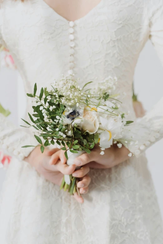 a woman in a wedding dress holding a bouquet, inspired by Eva Gonzalès, manuka, zoomed out view, real details, 3/4 front view