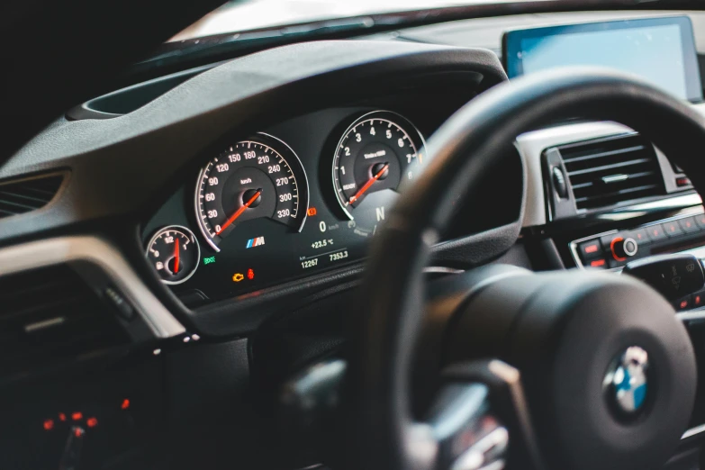 a close up of the dashboard of a car, unsplash, bmw, avatar image, tubes and gauges, profile image