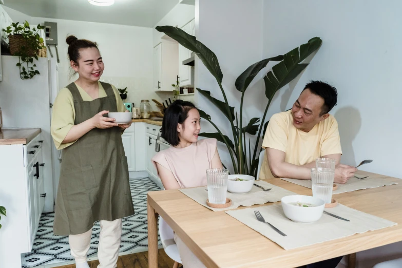 a couple of people that are sitting at a table, on kitchen table, darren quach, fully functional, multiple stories