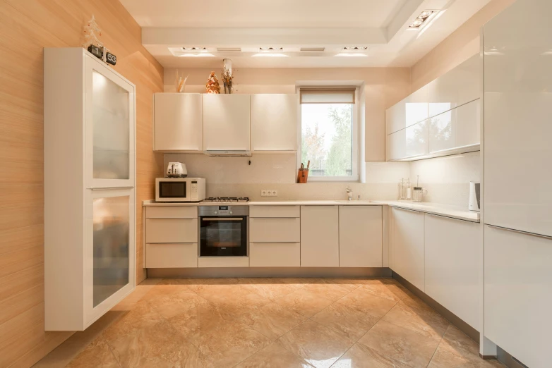 the kitchen is clean and ready for us to use, a picture, by Adam Marczyński, unsplash, light and space, beige, shiny marble floor, 3 doors, extremely luminous bright design