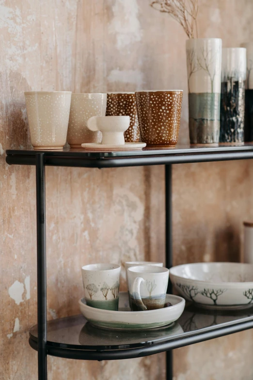 a shelf with cups and plates on it, by Jan Tengnagel, trending on unsplash, on textured base; store website, metal readymade, soft details, brown