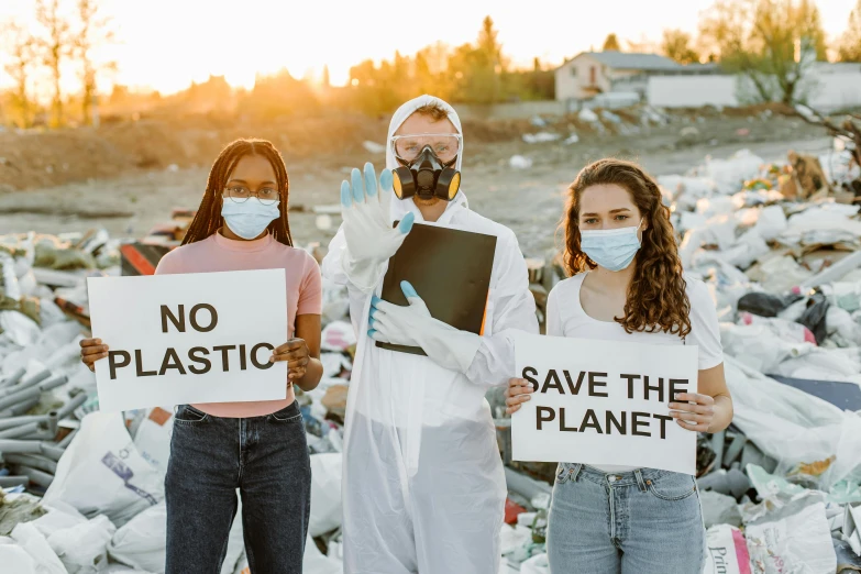 three people holding signs that say no plastic, save the planet, a picture, trending on pexels, plasticien, avatar image, landfill, white, 3 4 5 3 1