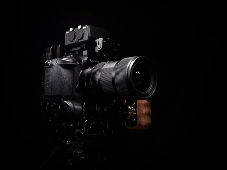 a close up of a camera on a tripod, by Daniel Seghers, v-ray 8k uhd, hasselblad medium format, on black background, sony a 7 siii