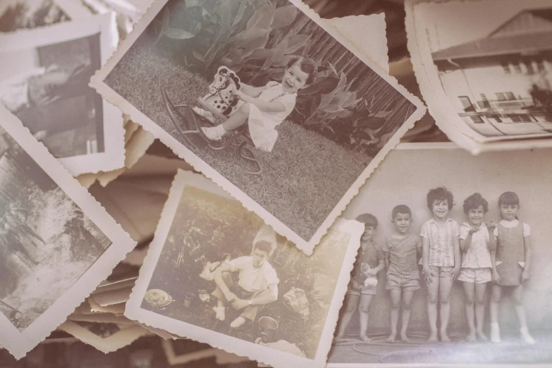 a bunch of old photos sitting on top of a table, pexels contest winner, childhood friend, 15081959 21121991 01012000 4k, album cover, archival quality image