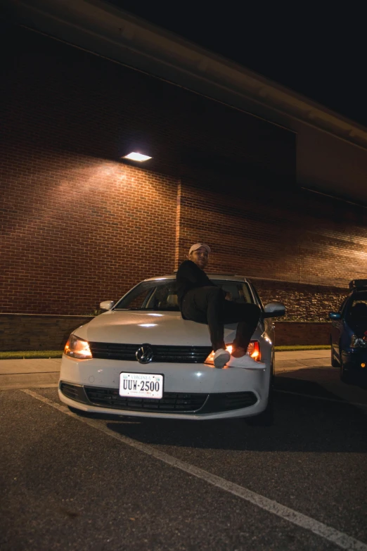 two cars parked in a parking lot at night, inspired by Elsa Bleda, renaissance, sassy pose, posing solo, rides, zachary corzine