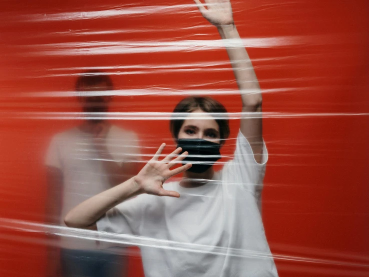 a man that is standing in front of a red wall, plastic wrap, teenage girl, on a gray background, motion lines