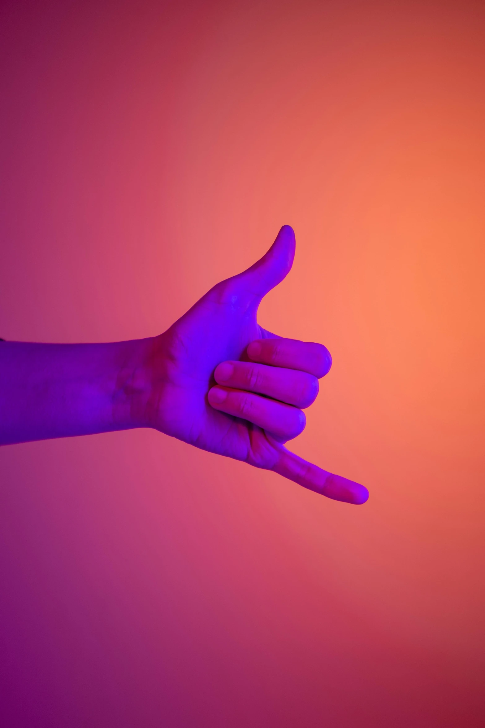 a close up of a person's hand holding something, synchromism, purple orange colors, giving a thumbs up to the camera, avatar image, high gradient