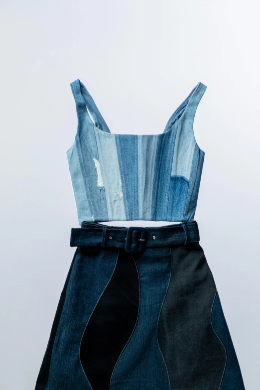 a denim dress on a mannequin mannequin mannequin mannequin mannequin mannequin mannequin manne, an album cover, inspired by René Burri, unsplash, crop top, 2995599206, junya watanabe, wearing a tanktop and skirt