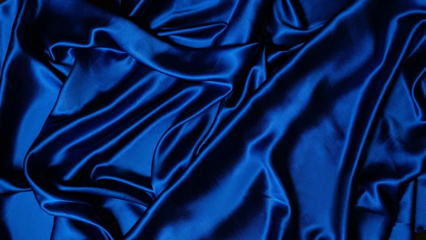 a close up of a blue satin material, inspired by Yves Klein, trending on unsplash, blue lighting, various colors, royal-blue