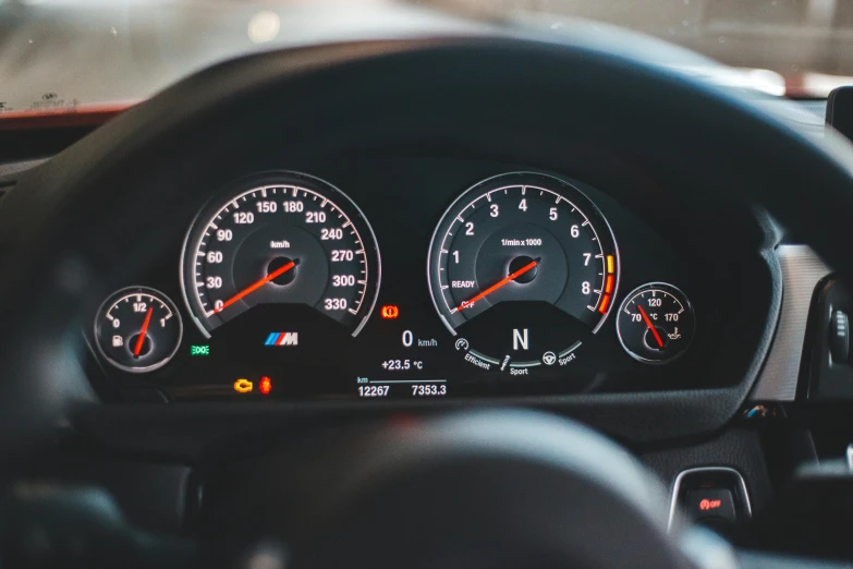 a close up of the dashboard of a car, by Daniel Lieske, unsplash, bmw, tubes and gauges, “hyper realistic, ad image