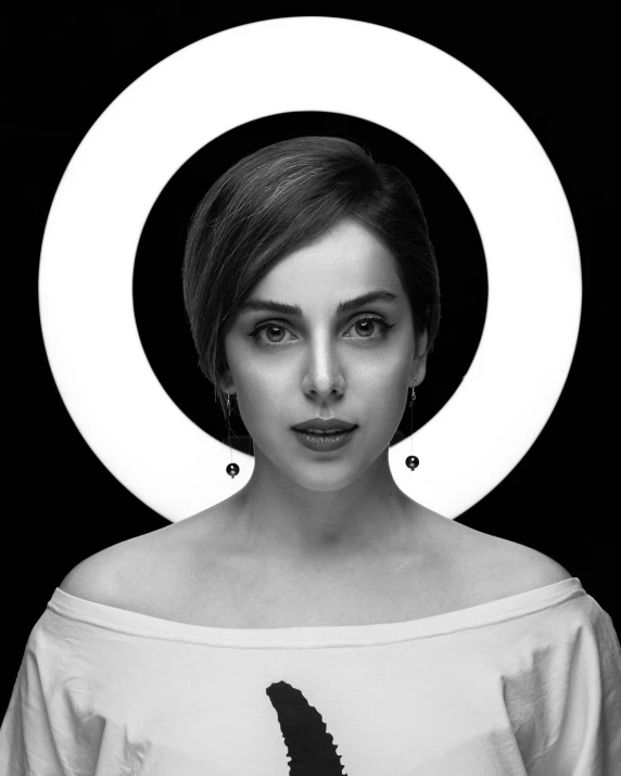 a black and white photo of a woman with a knife, inspired by Galen Dara, pexels contest winner, serial art, alison brie, a woman holding an orb, circle eyes, slightly minimal