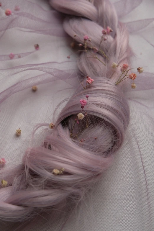 a close up of a pink braided hair, inspired by Pierre-Joseph Redouté, trending on pexels, conceptual art, made of dried flowers, light purple mist, flowing realistic fabric, miniature cosmos