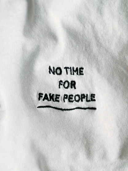 a white shirt that says no time for fake people, ( ( risograph ) ), official product image