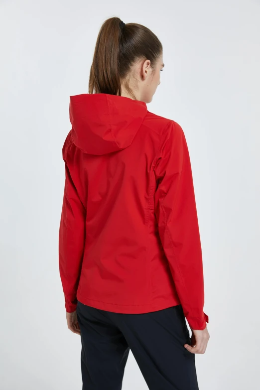 a woman wearing a red jacket and black pants, back view », full product shot, rainy, 8l