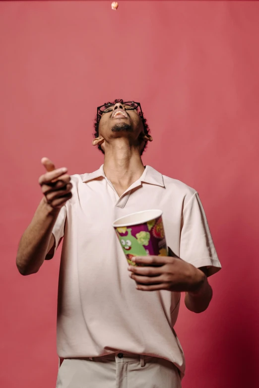 a man holding a cup of coffee and a cell phone, an album cover, by Andrew Domachowski, hyperrealism, psychedelic hip-hop, with nerdy glasses and goatee, portrait of tall, with a straw