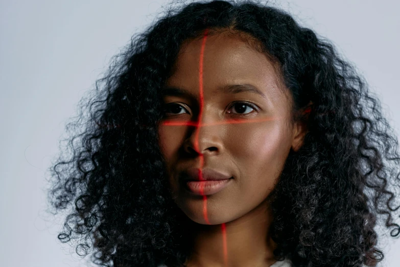 a woman with a red cross on her face, trending on pexels, square facial structure, mixed-race woman, integrated synthetic android, high - resolution scan