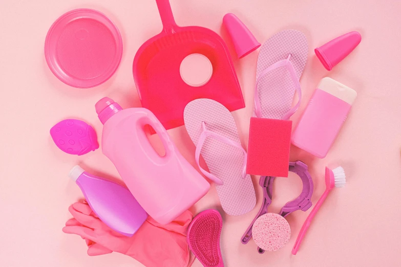 a pile of cleaning supplies sitting on top of a table, trending on pexels, plasticien, pink color palette, silicone skin, thumbnail, flatlay