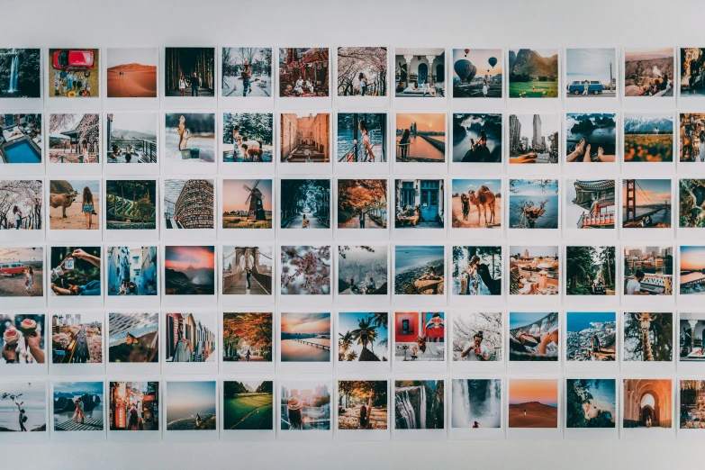a bunch of pictures hanging on a wall, a polaroid photo, trending on pexels, 256x256, photo mosaic, panoramic photography, no watermarks