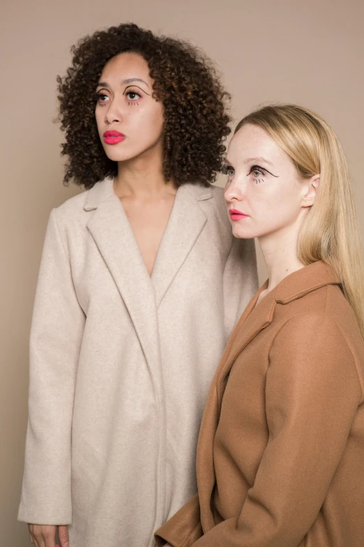 a couple of women standing next to each other, inspired by Vanessa Beecroft, trending on pexels, renaissance, light brown coat, headshot, fair complexion, 15081959 21121991 01012000 4k