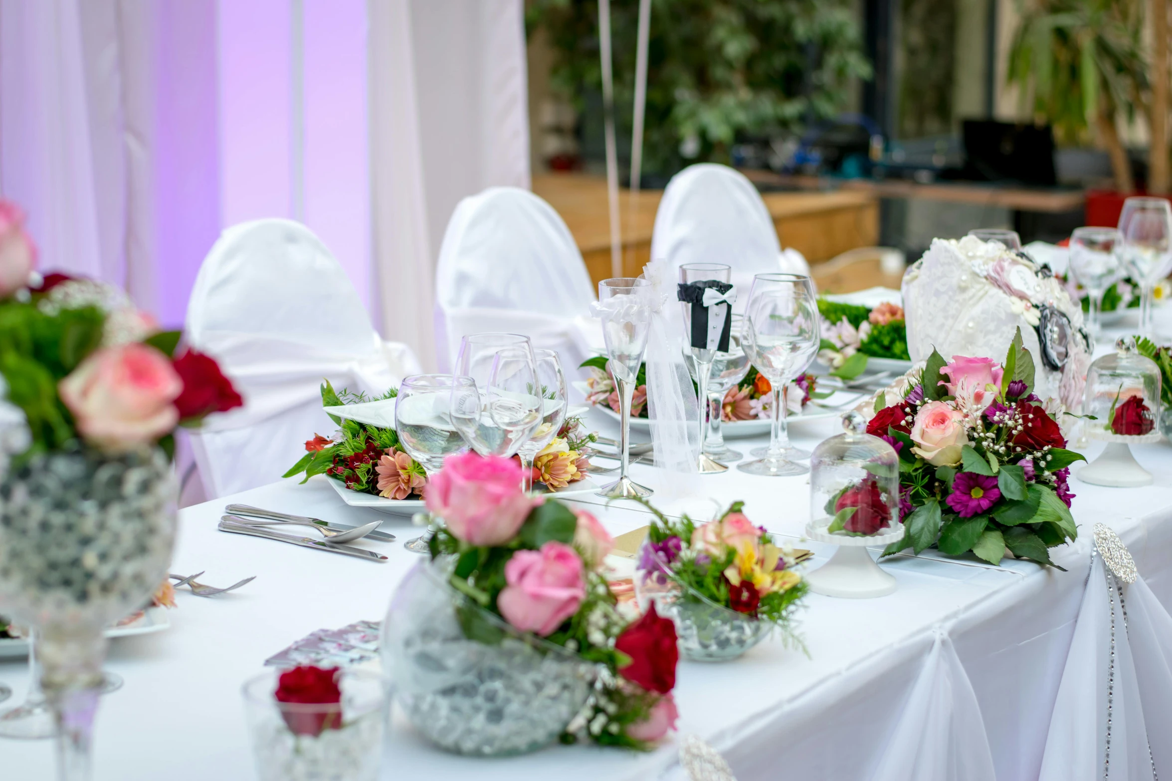 a table that has a bunch of flowers on it, pexels contest winner, white tablecloth, formal wear, thumbnail, white and pink