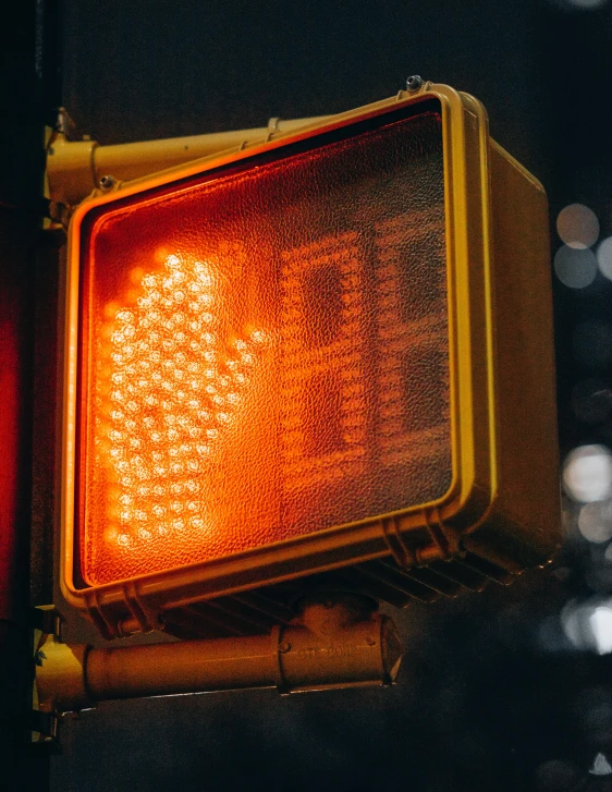 a close up of a traffic light on a pole, unsplash, glowing fingers, orange glowing hair, pixelated, sign