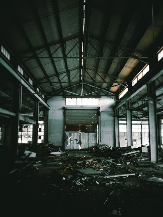 an empty warehouse with lots of debris on the floor, unsplash contest winner, shipyard, instagram story, ( apocalyptic ) 8 k, analogue photo