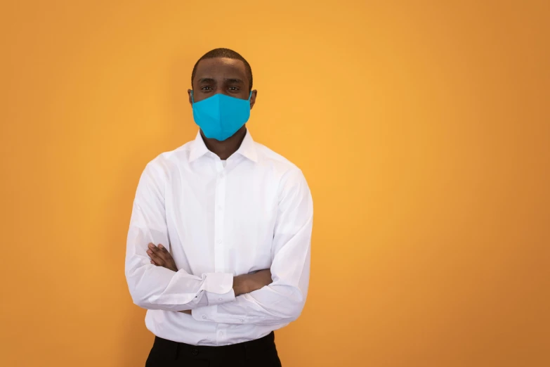 a man with a blue mask on his face, an album cover, pexels contest winner, hyperrealism, mkbhd, cyan and orange, healthcare, no - text no - logo