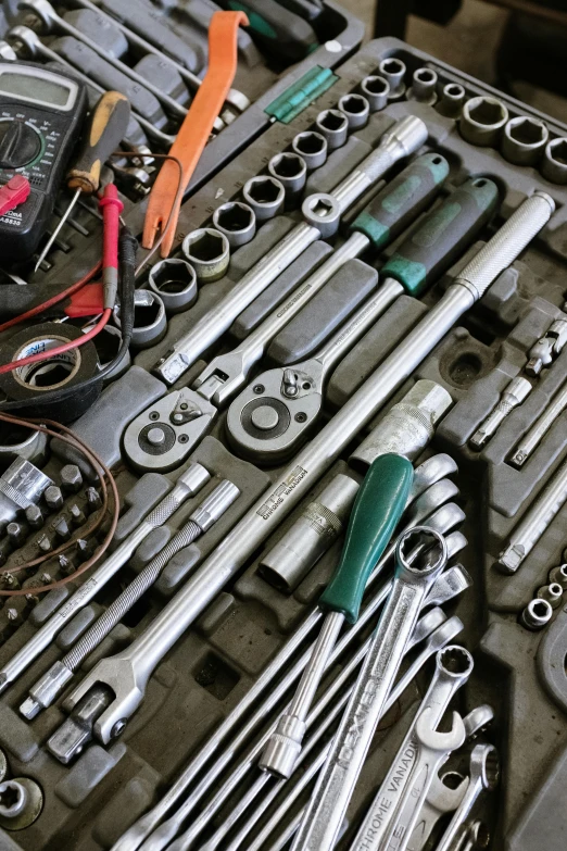 a bunch of tools sitting on top of a table, machinery, square, uploaded, maintenance