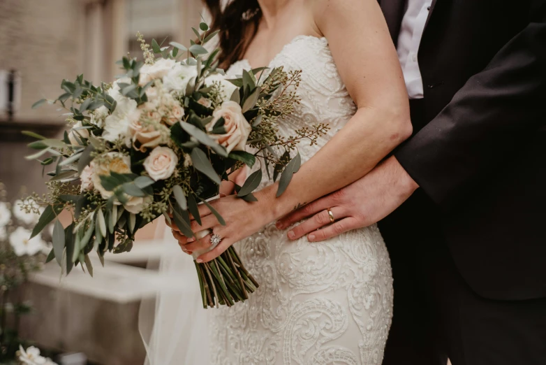 a bride and groom standing next to each other, by Carey Morris, pexels contest winner, romanticism, bouquet, intricate details. front on, manicured, romantic lead