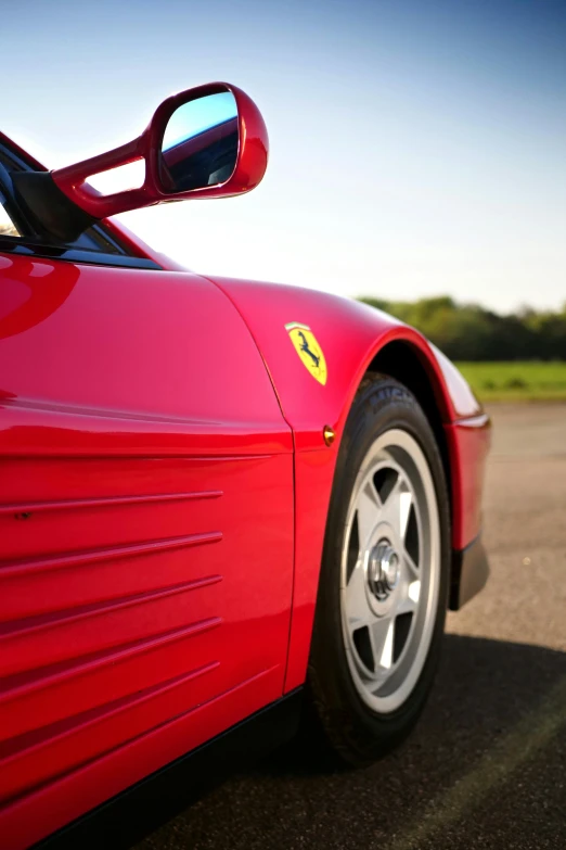 a red sports car parked on the side of the road, a photo, unsplash, photorealism, with elements of the f40, medium closeup, 15081959 21121991 01012000 4k