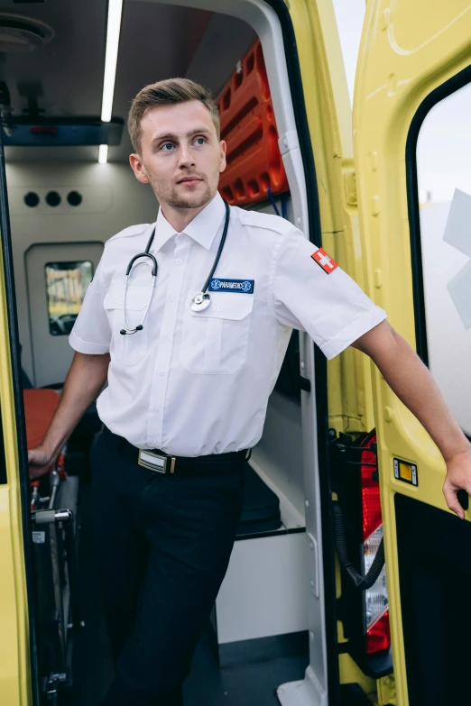 a man standing in the open door of an ambulance, by Christen Dalsgaard, happening, full uniform, lookbook, avatar image, high quality image
