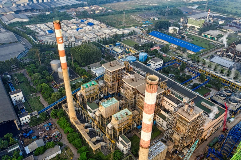 an aerial view of a large industrial plant, a portrait, shutterstock, india, profile image, journalism photo, thumbnail