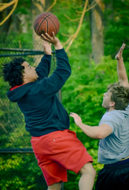 a group of young men playing a game of basketball, by Matt Cavotta, pexels contest winner, renaissance, movie action still frame, at a park, promo image, 1 5 0 4