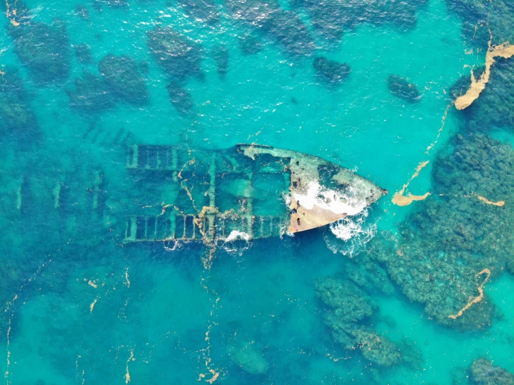 a ship that is sitting in the water, by Daniel Lieske, pexels contest winner, hurufiyya, reefs, flattened, jamaica, thumbnail