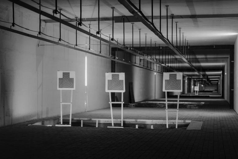 a black and white photo of a hallway, op art, laser rifles, target reticles, outdoor photo, performance