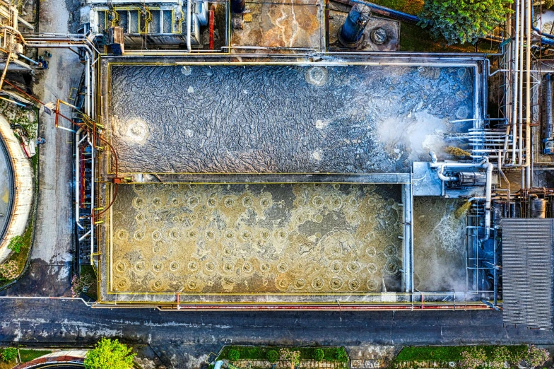 an aerial view of a water treatment plant, a portrait, by Jan Rustem, process art, mouldy juice, hdr photo, thumbnail, outdoor photo