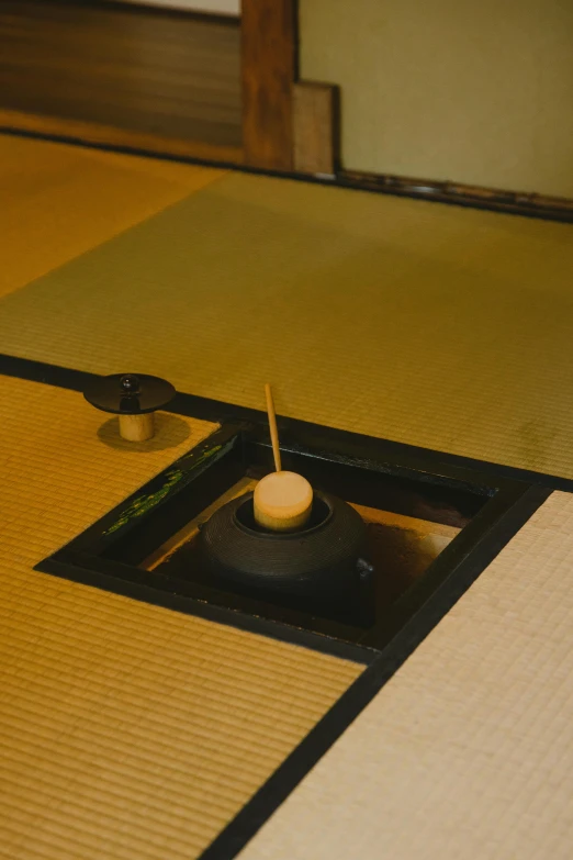 a tea pot sitting on top of a wooden table, japanese bathhouse, photograph from above, square, incense