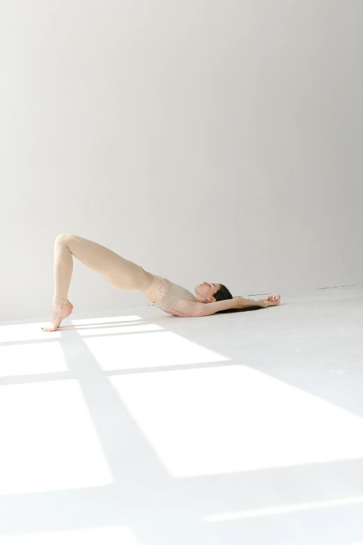 a woman in a black leo leo leo leo leo leo leo leo leo leo leo leo leo, inspired by Fei Danxu, unsplash, arabesque, on a white table, bent - over posture, translucent white skin, lying on an abstract