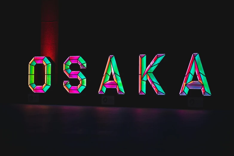 a neon sign that says osaka at night, a hologram, inspired by Okada Beisanjin, unsplash, sōsaku hanga, voxels, multi - coloured, intricate hakama, digital banner