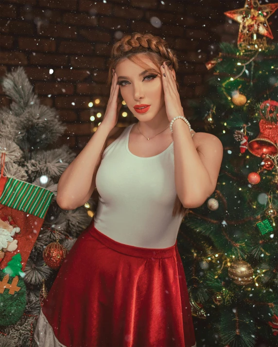 a woman standing in front of a christmas tree, an album cover, inspired by Julia Pishtar, trending on pexels, tachisme, better known as amouranth, white skirt and barechest, smirking deviously, gif