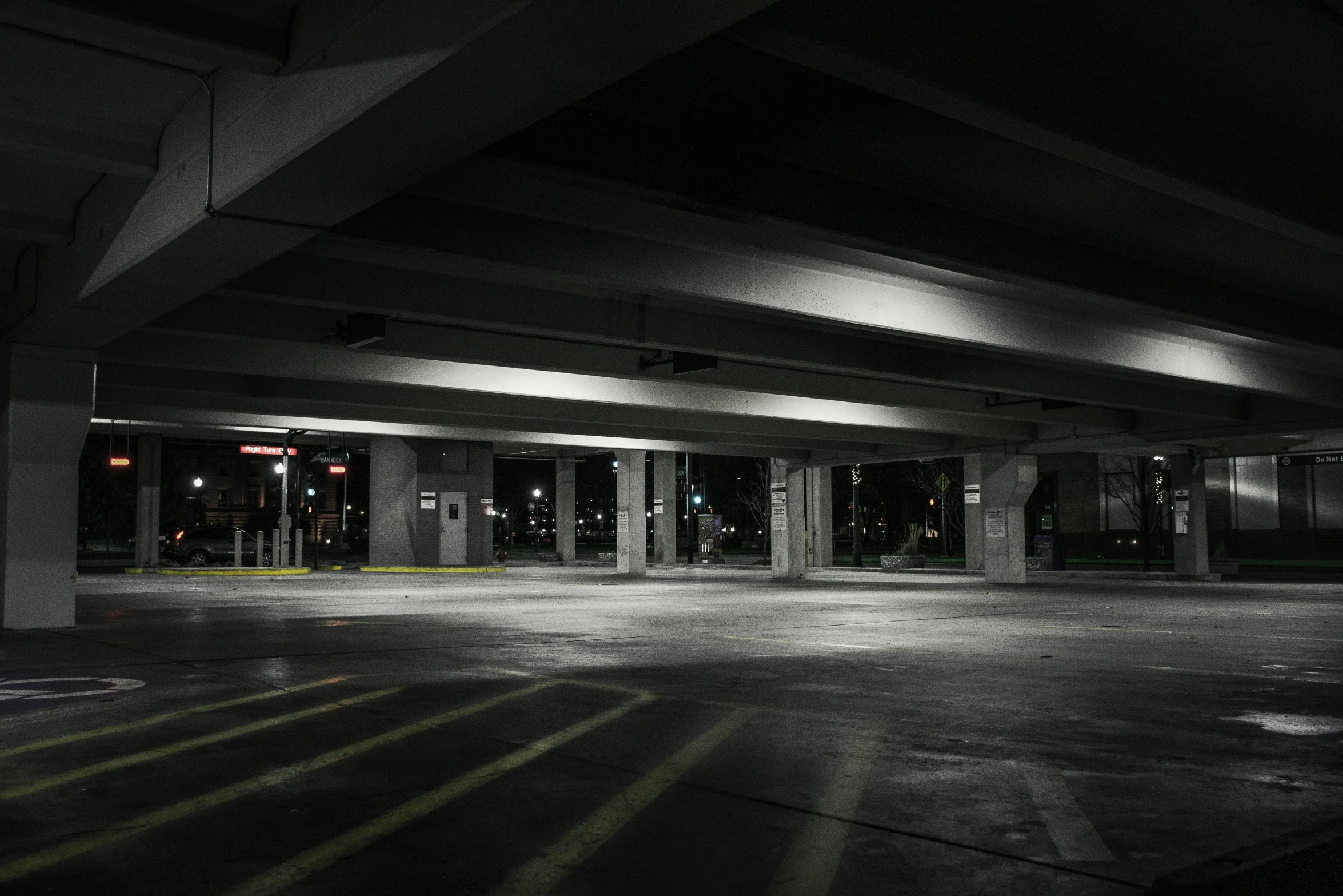 a black and white photo of an empty parking garage, unsplash, square, night life, ilustration, fan favorite